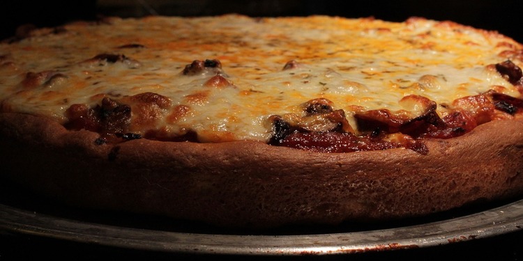 Deep Dish Mediterranean Pizza with Sausage and Bacon
